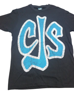 REMERA - CJS - NINOS - NEGRO